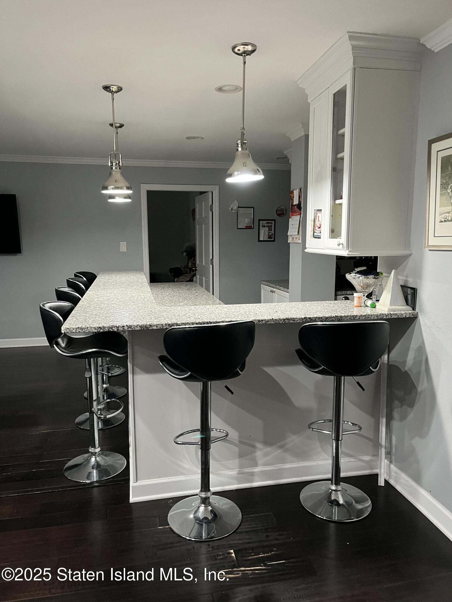 1000 Clove Road, Unit 6O & 6P Staten Island, NY 10301 - Photo 13 of 45 a room with table and chairs