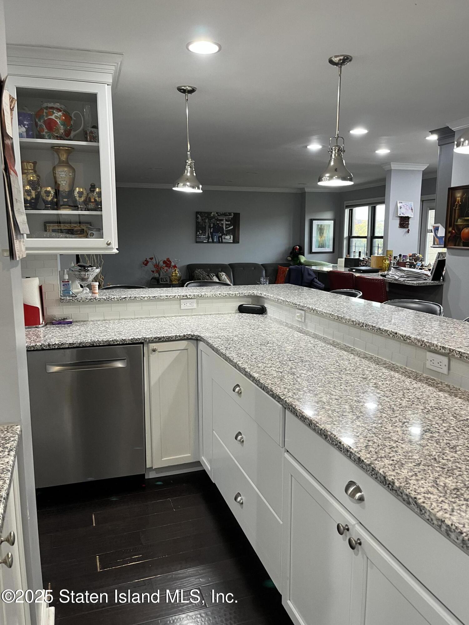 1000 Clove Road, Unit 6O & 6P Staten Island, NY 10301 - Photo 15 of 45 a large white kitchen with a sink a counter space and appliances