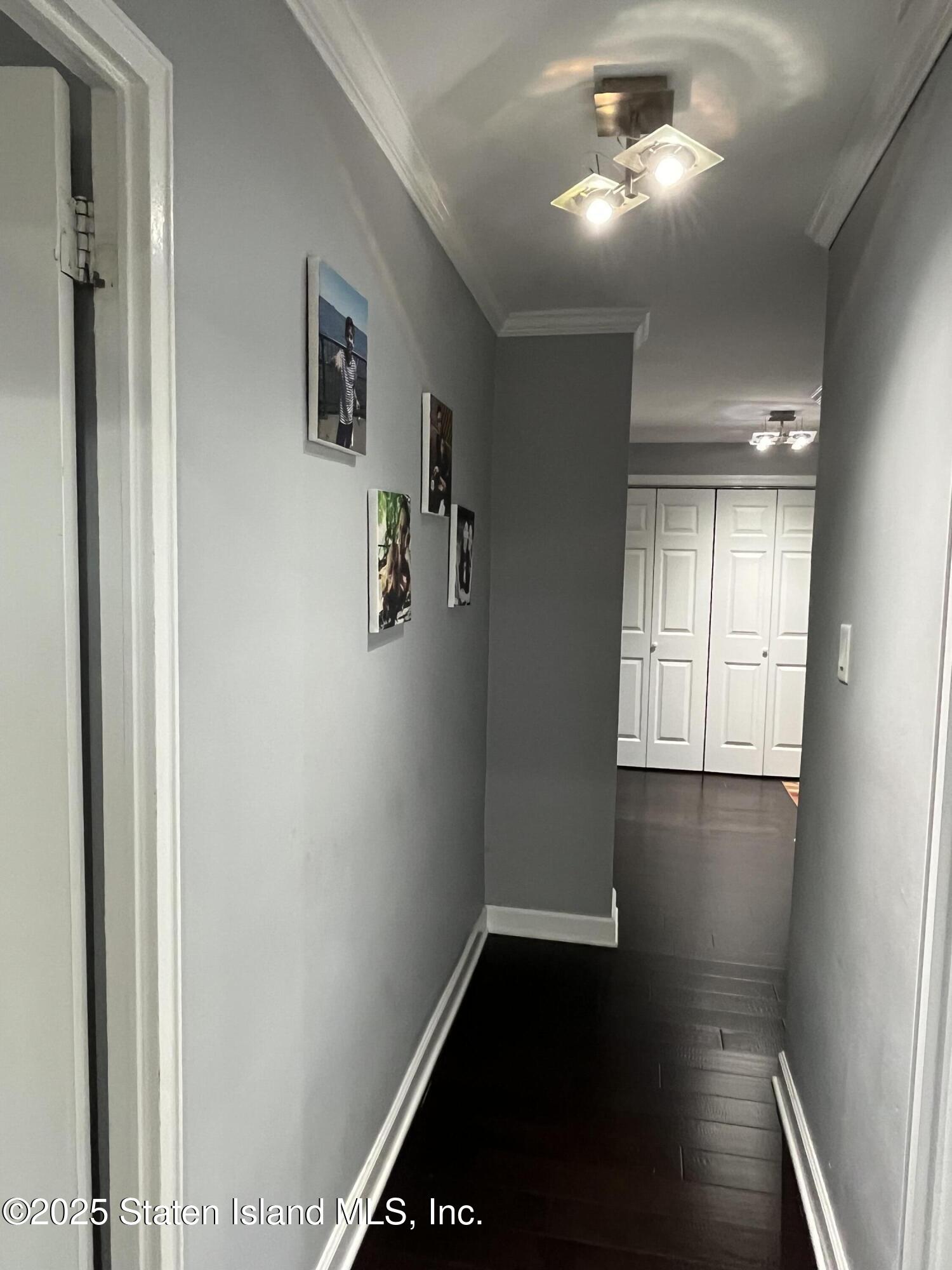 1000 Clove Road, Unit 6O & 6P Staten Island, NY 10301 - Photo 20 of 45 a view of empty room with wooden floor