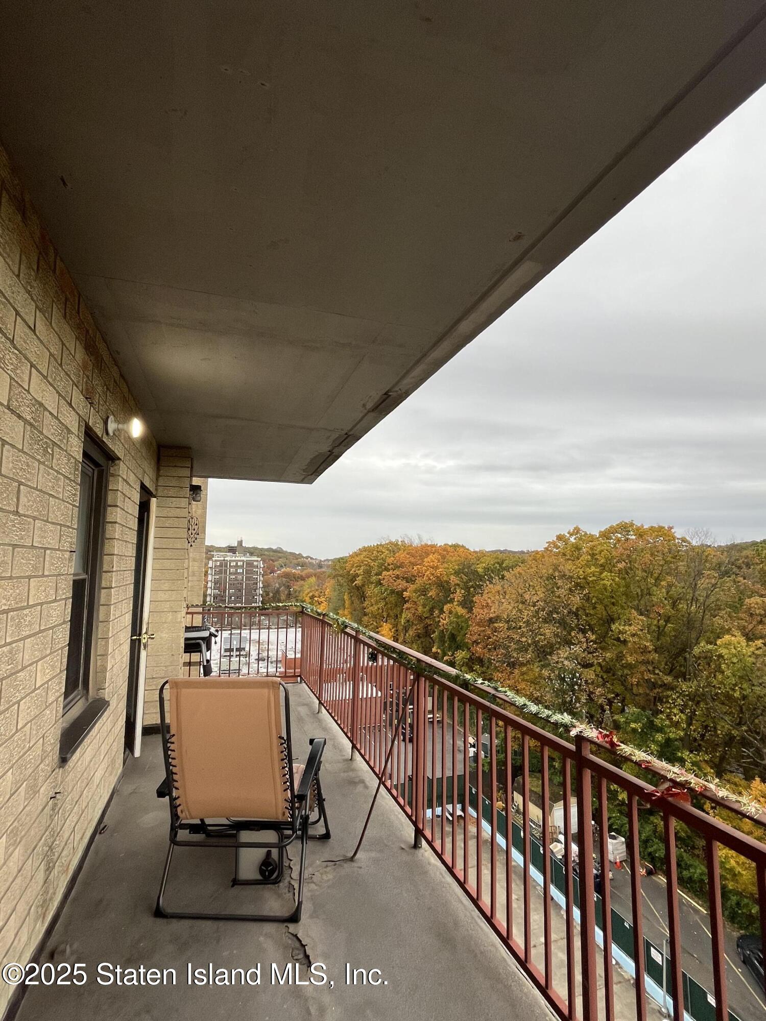 1000 Clove Road, Unit 6O & 6P Staten Island, NY 10301 - Photo 29 of 45 a view of a balcony with furniture