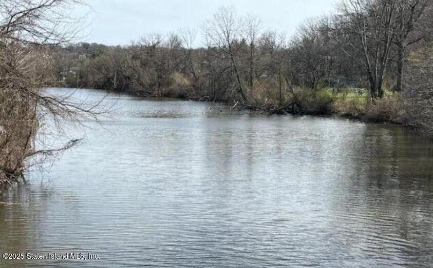 1000 Clove Road, Unit 6O & 6P Staten Island, NY 10301 - Photo 40 of 45 a view of swimming pool with mountain view