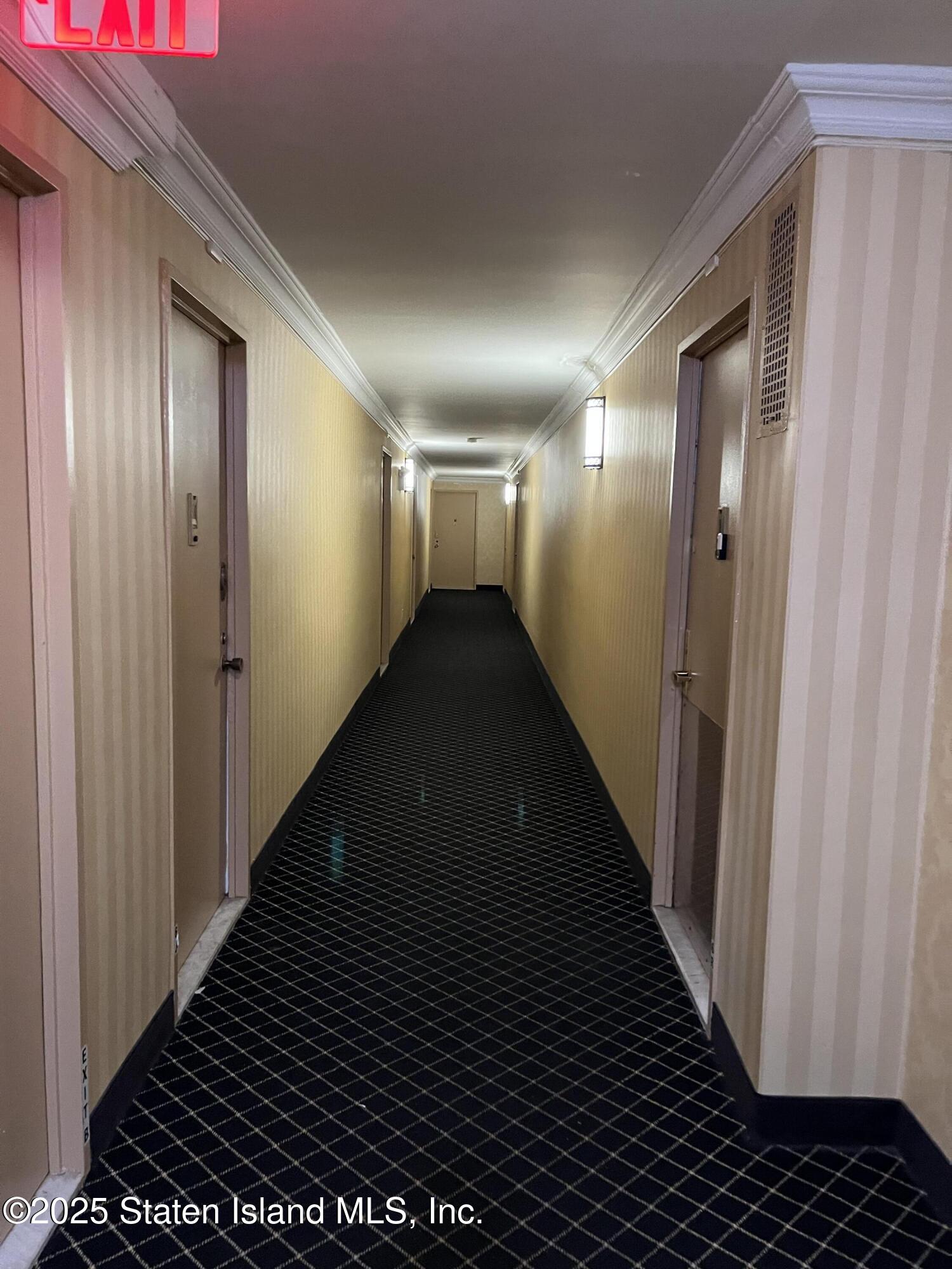 1000 Clove Road, Unit 6O & 6P Staten Island, NY 10301 - Photo 6 of 45 a view of a hallway with wooden floor