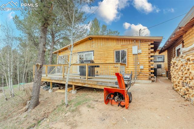 847 Timber Ridge Road Divide, CO 80814 - Photo 28 of 41 Wood-sided exterior featuring a spacious wood deck