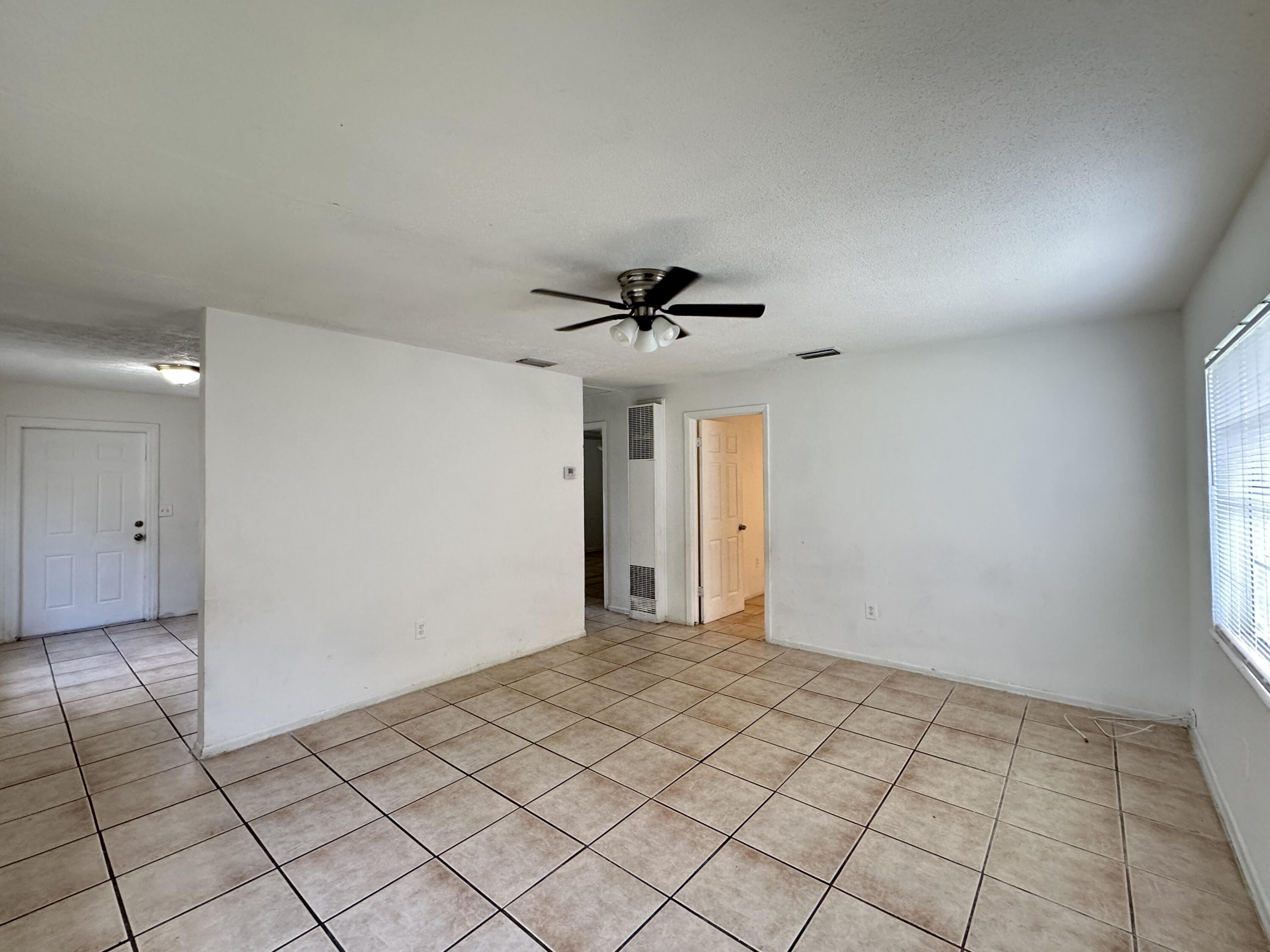 1107 North 21st Street, Unit A & B Fort Pierce, FL 34950 - Photo 14 of 24 a view of an empty room and window
