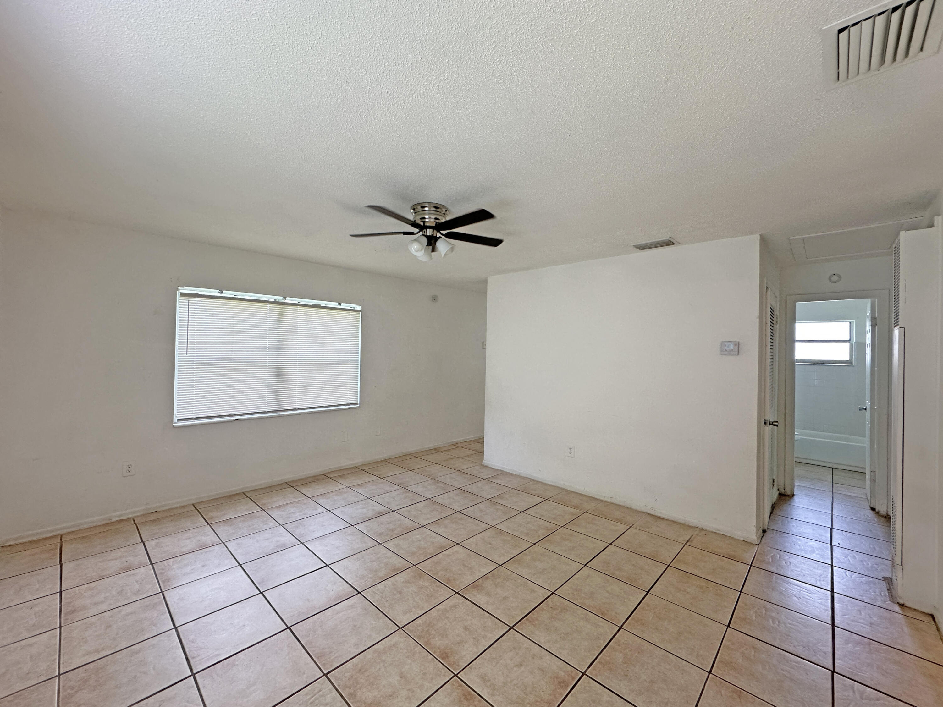 1107 North 21st Street, Unit A & B Fort Pierce, FL 34950 - Photo 15 of 24 a view of an empty room and window