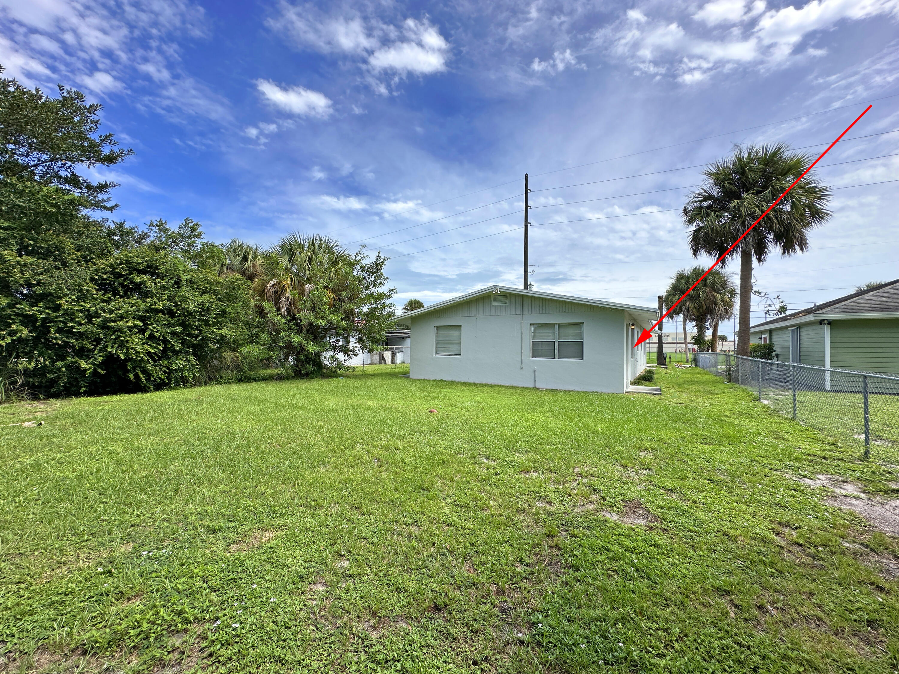 1107 North 21st Street, Unit A & B Fort Pierce, FL 34950 - Photo 24 of 24 a front view of a house with garden