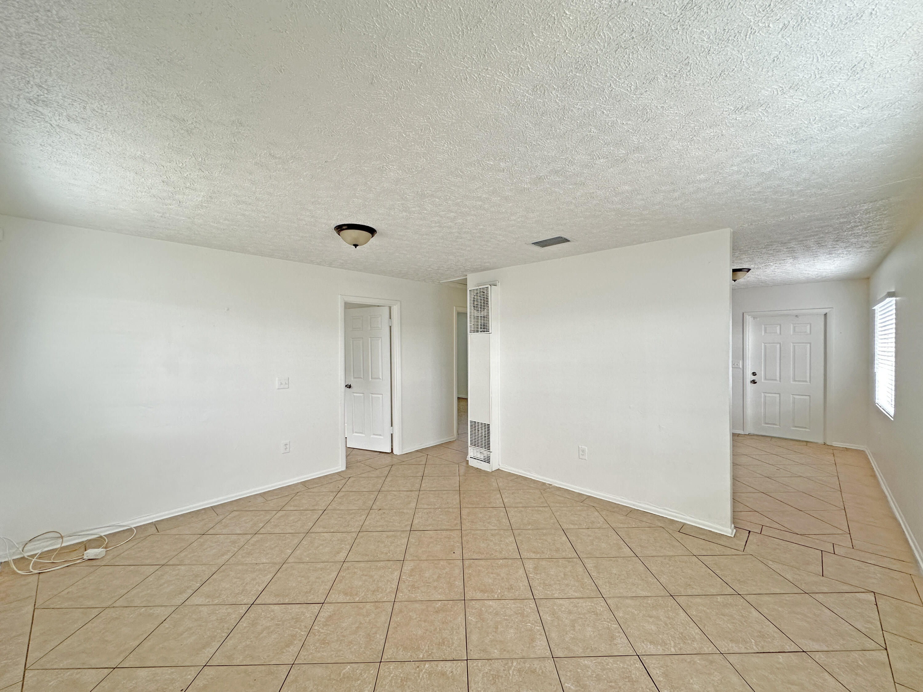 1107 North 21st Street, Unit A & B Fort Pierce, FL 34950 - Photo 4 of 24 a view of an empty room