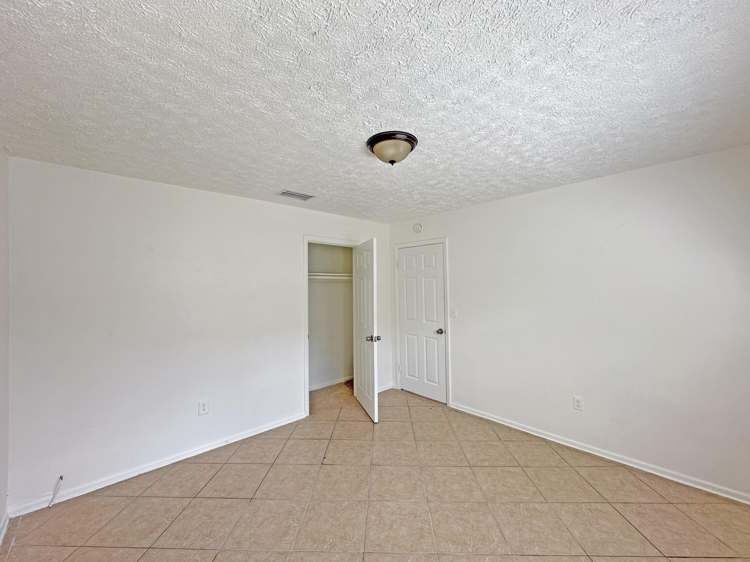 1107 North 21st Street, Unit A & B Fort Pierce, FL 34950 - Photo 6 of 24 a view of an empty room