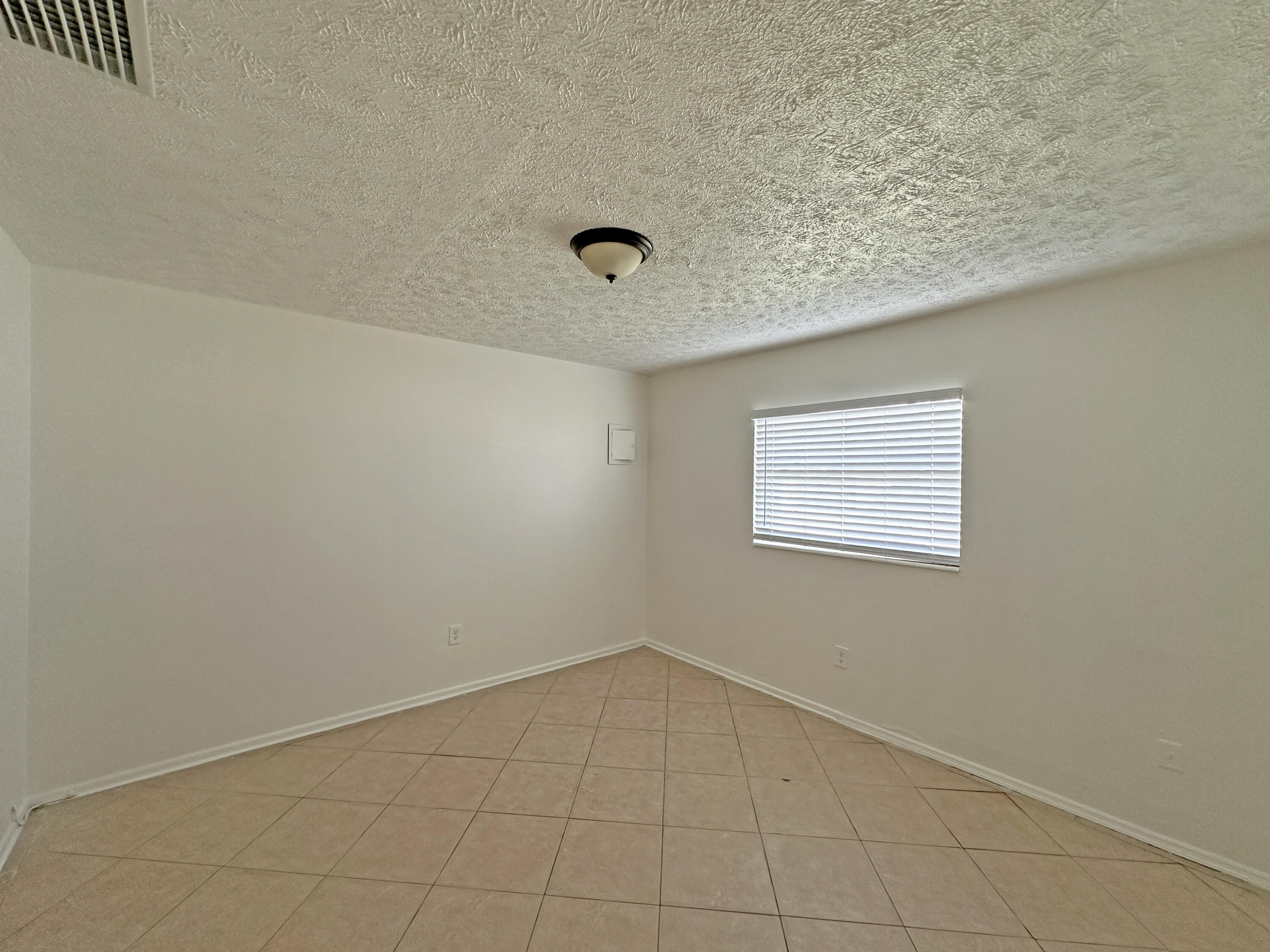 1107 North 21st Street, Unit A & B Fort Pierce, FL 34950 - Photo 8 of 24 a view of an empty room