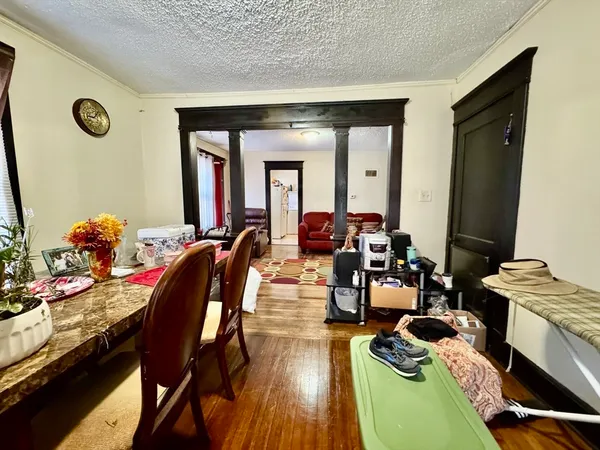 a view of a livingroom with furniture and lounge chair