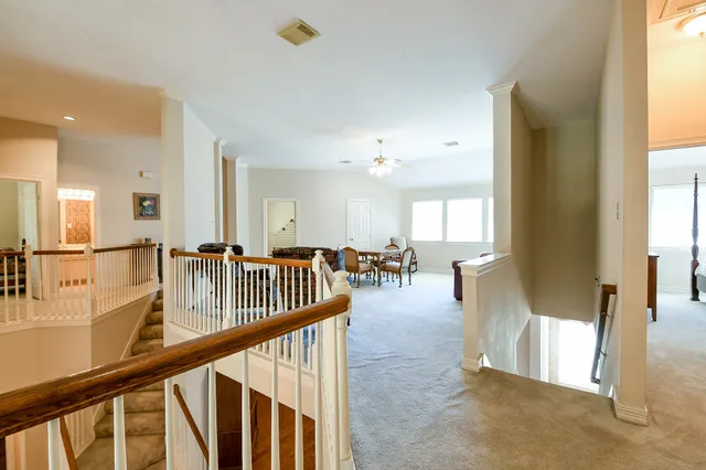 a view of a living room and dining room