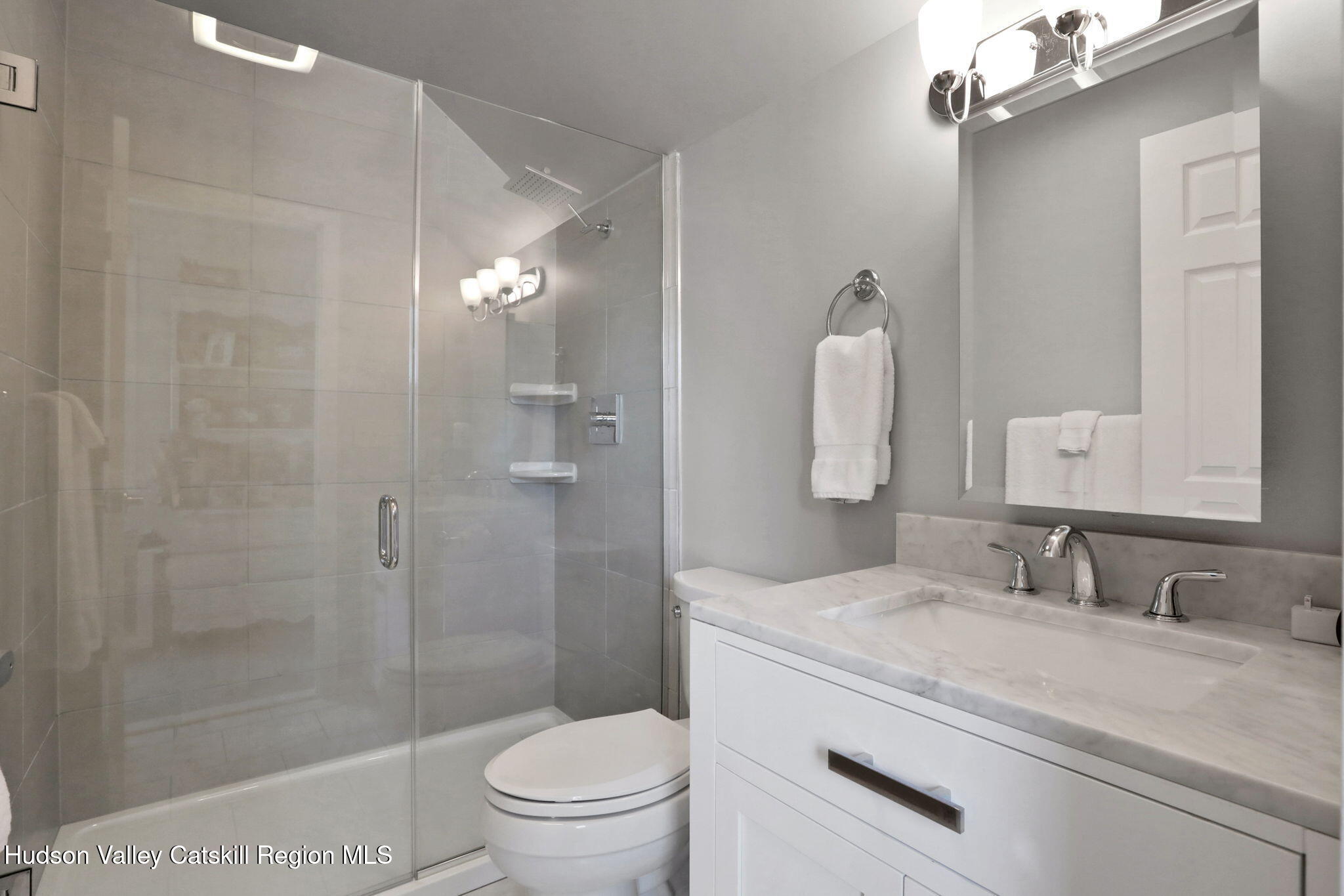 3 Finger Street Saugerties, NY 12477 - Photo 14 of 26 a bathroom with a granite countertop sink a toilet and shower