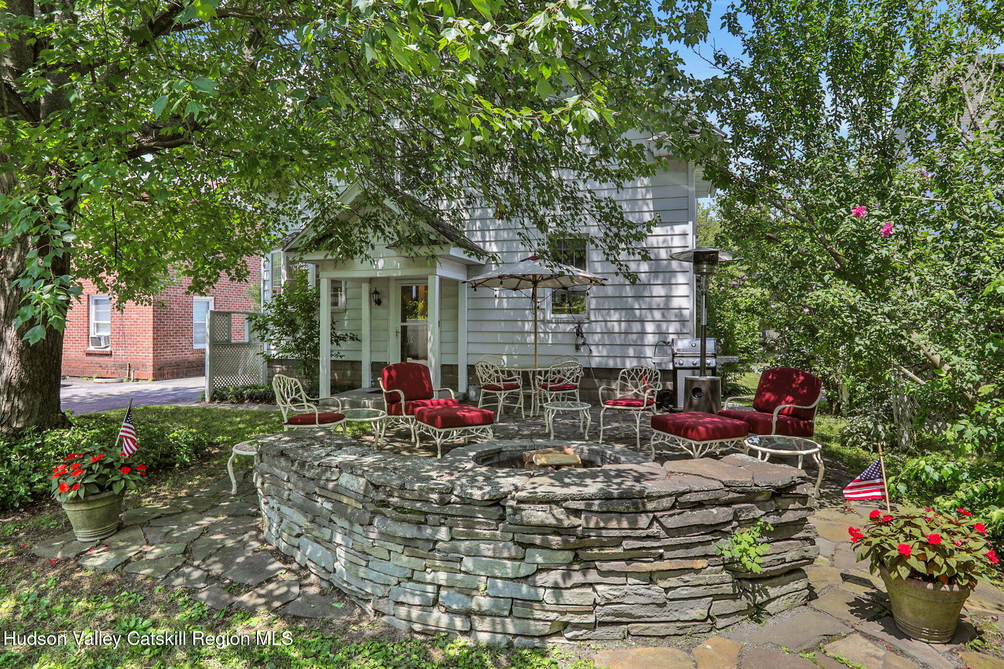 3 Finger Street Saugerties, NY 12477 - Photo 22 of 26 a view of a chairs and tables in the backyard of the house