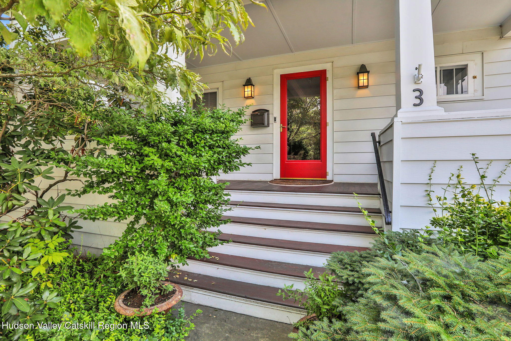 3 Finger Street Saugerties, NY 12477 - Photo 24 of 26 a front view of a house with plants and garden