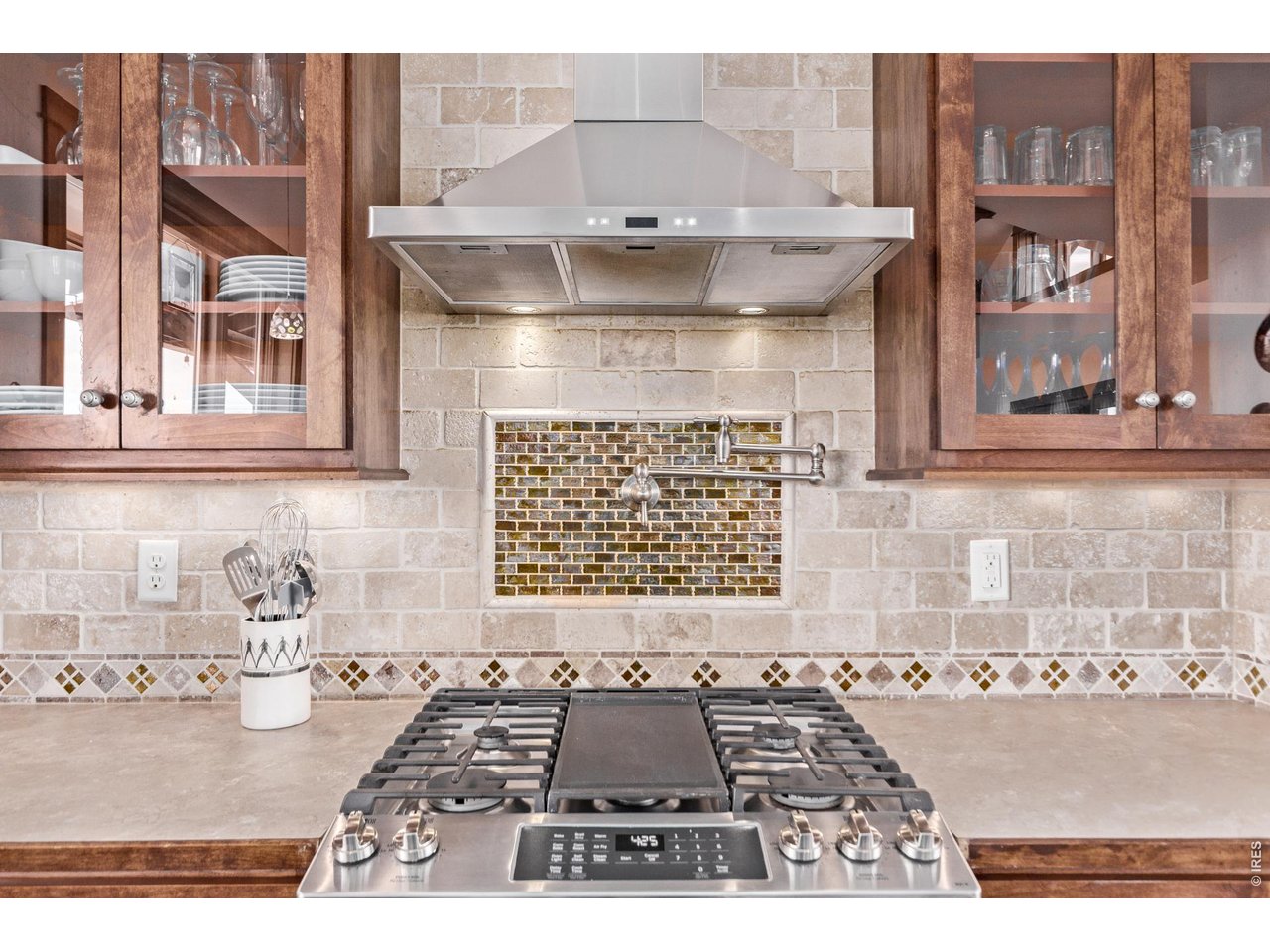 399 Northview Road Berthoud, CO 80513 - Photo 11 of 39 a view of a kitchen sink and chandelier