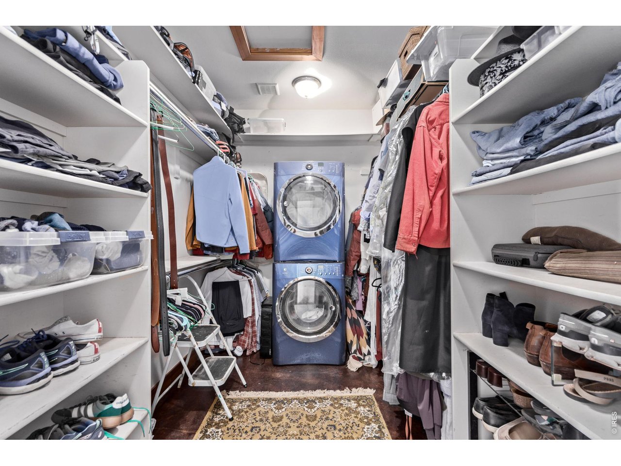 399 Northview Road Berthoud, CO 80513 - Photo 17 of 39 a view of walk in closet with clothes and shoes