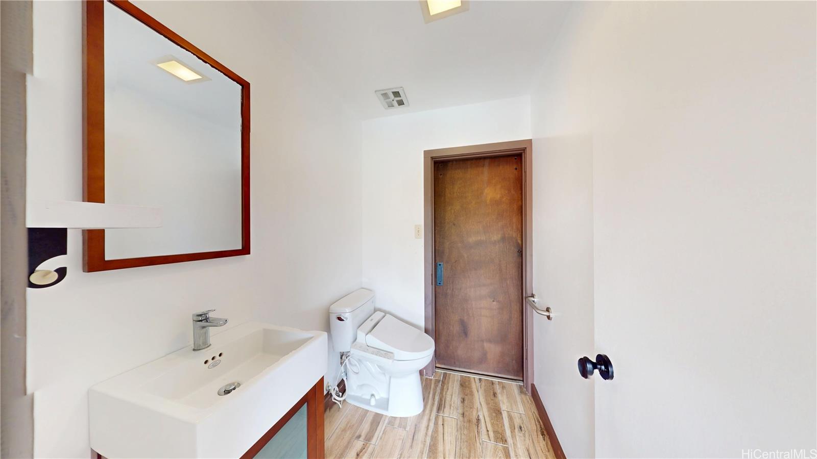 45-608 Halekou Road Kaneohe, HI 96744 - Photo 9 of 25 Half bath adjacent to the kitchen