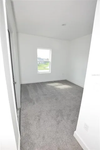 a view of a room with an empty space