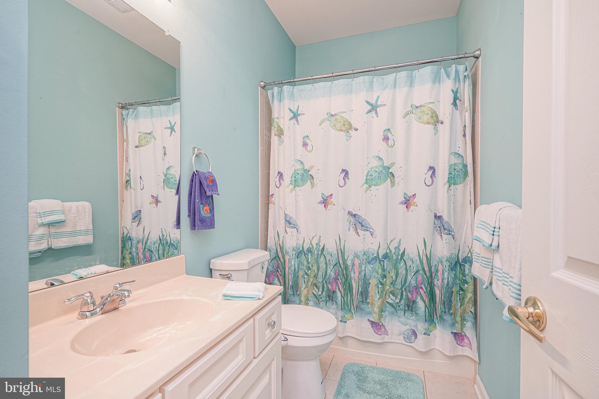 213 Limerick Street Absecon, NJ 08205 - Photo 26 of 39 Coastal charm in a serene bathroom.
