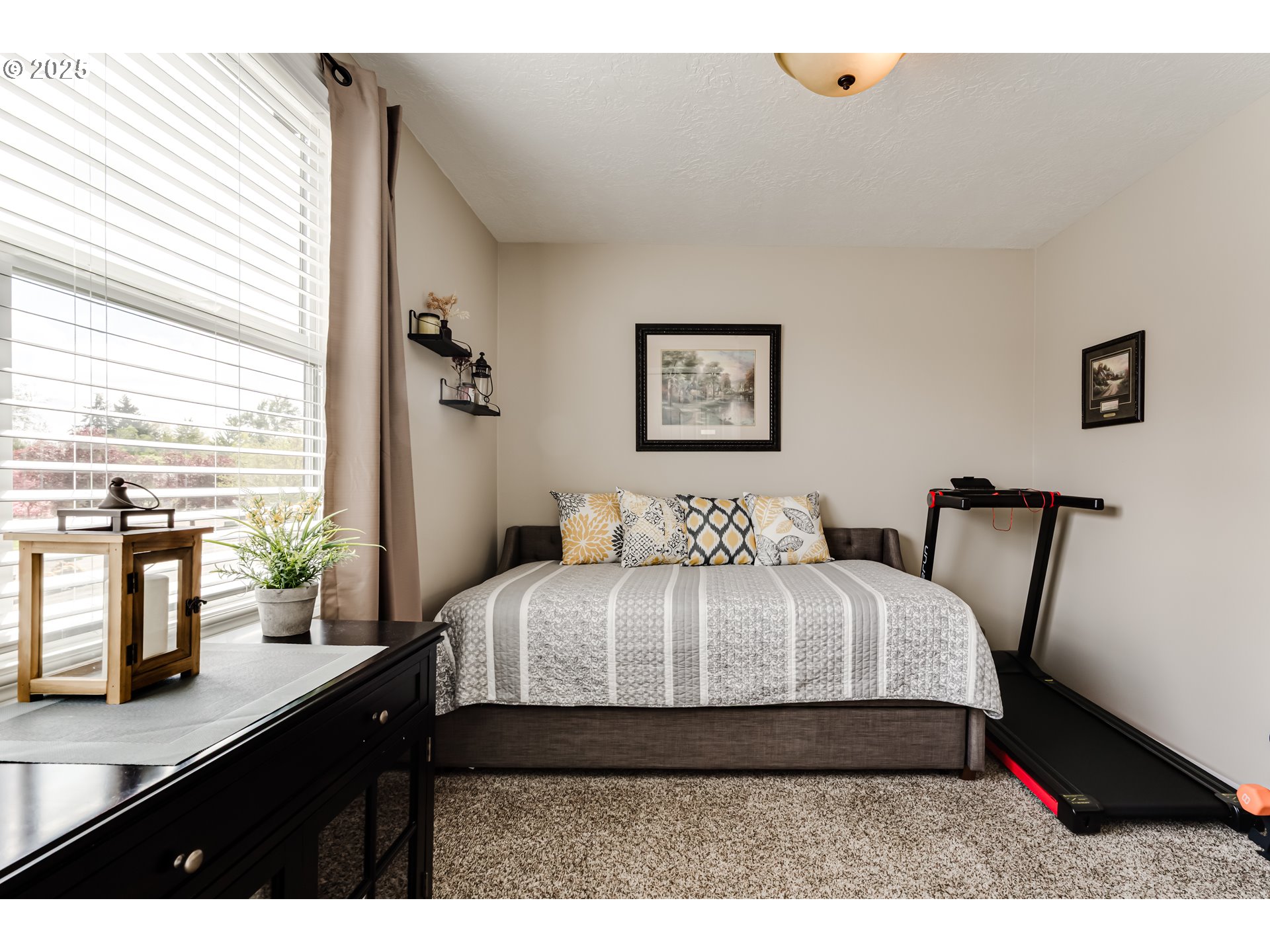 2852 Metolius Drive Eugene, OR 97408 - Photo 37 of 48 a bedroom with a bed window with table and chair
