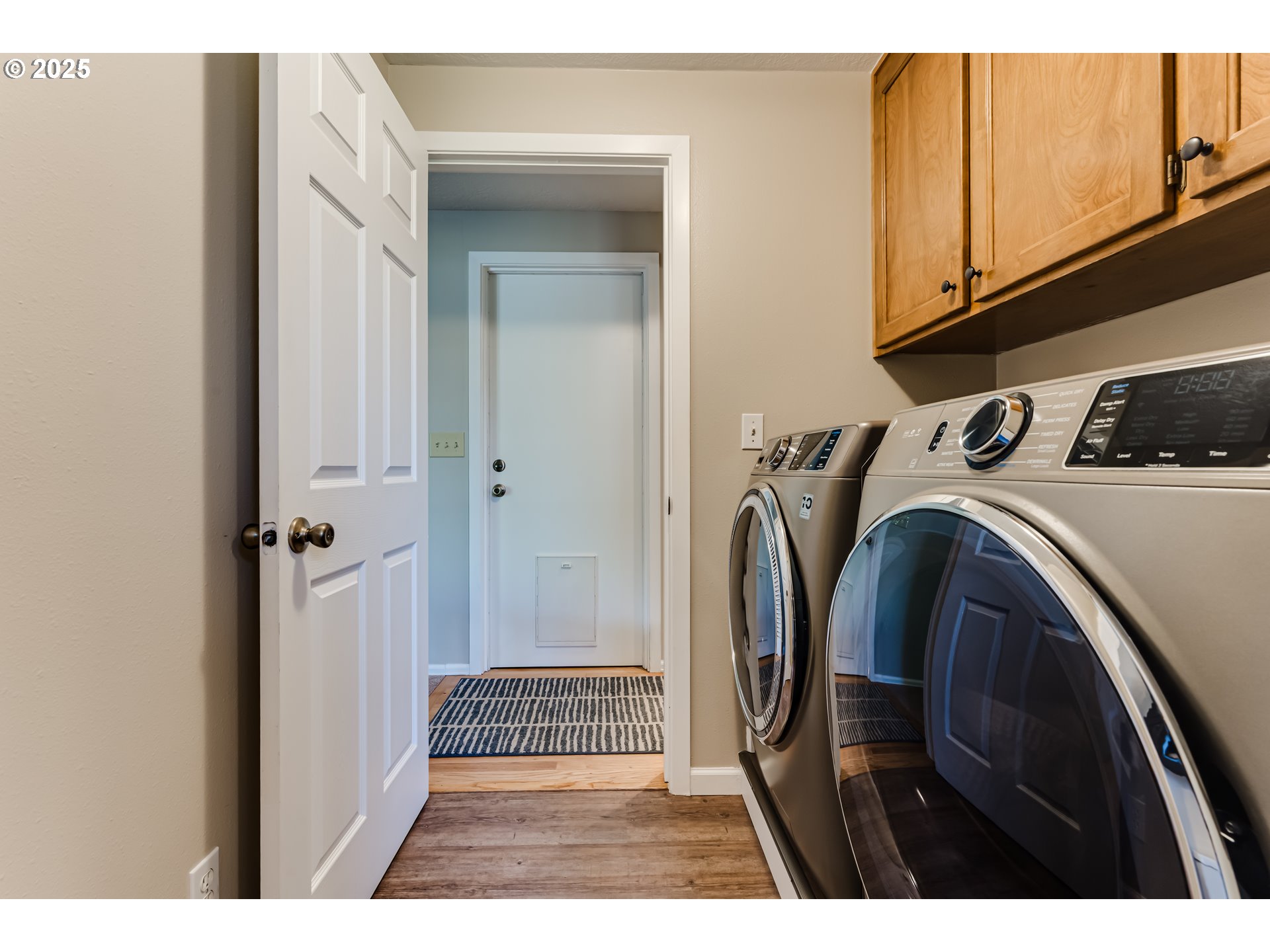 2852 Metolius Drive Eugene, OR 97408 - Photo 40 of 48 a view of walk in closet with clothes and shoes