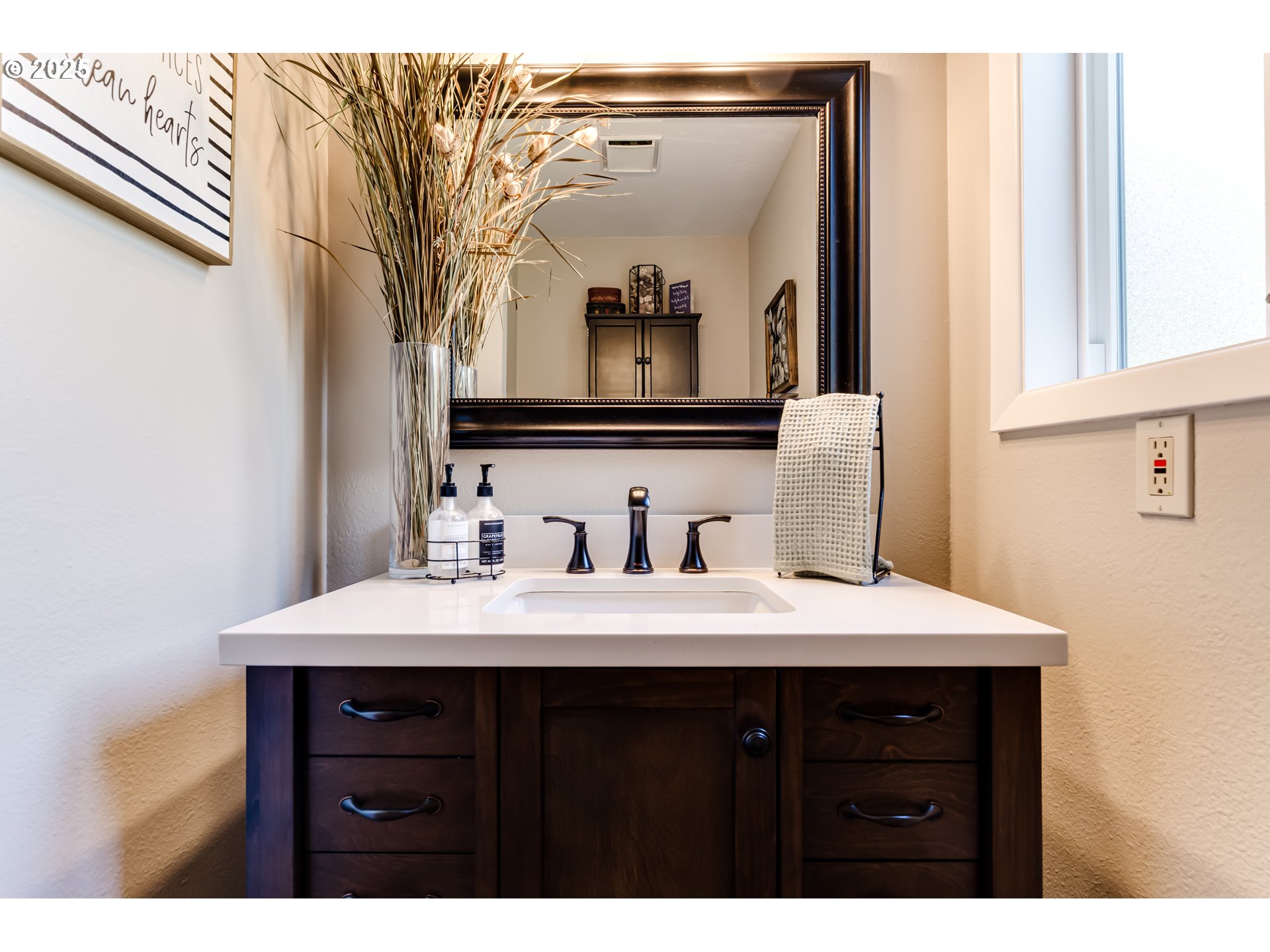 2852 Metolius Drive Eugene, OR 97408 - Photo 41 of 48 a bathroom with a sink vanity and a mirror