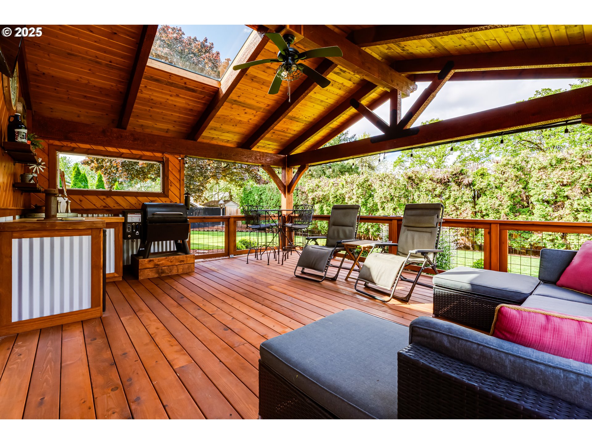 2852 Metolius Drive Eugene, OR 97408 - Photo 42 of 48 a outdoor living space with furniture and wooden floor
