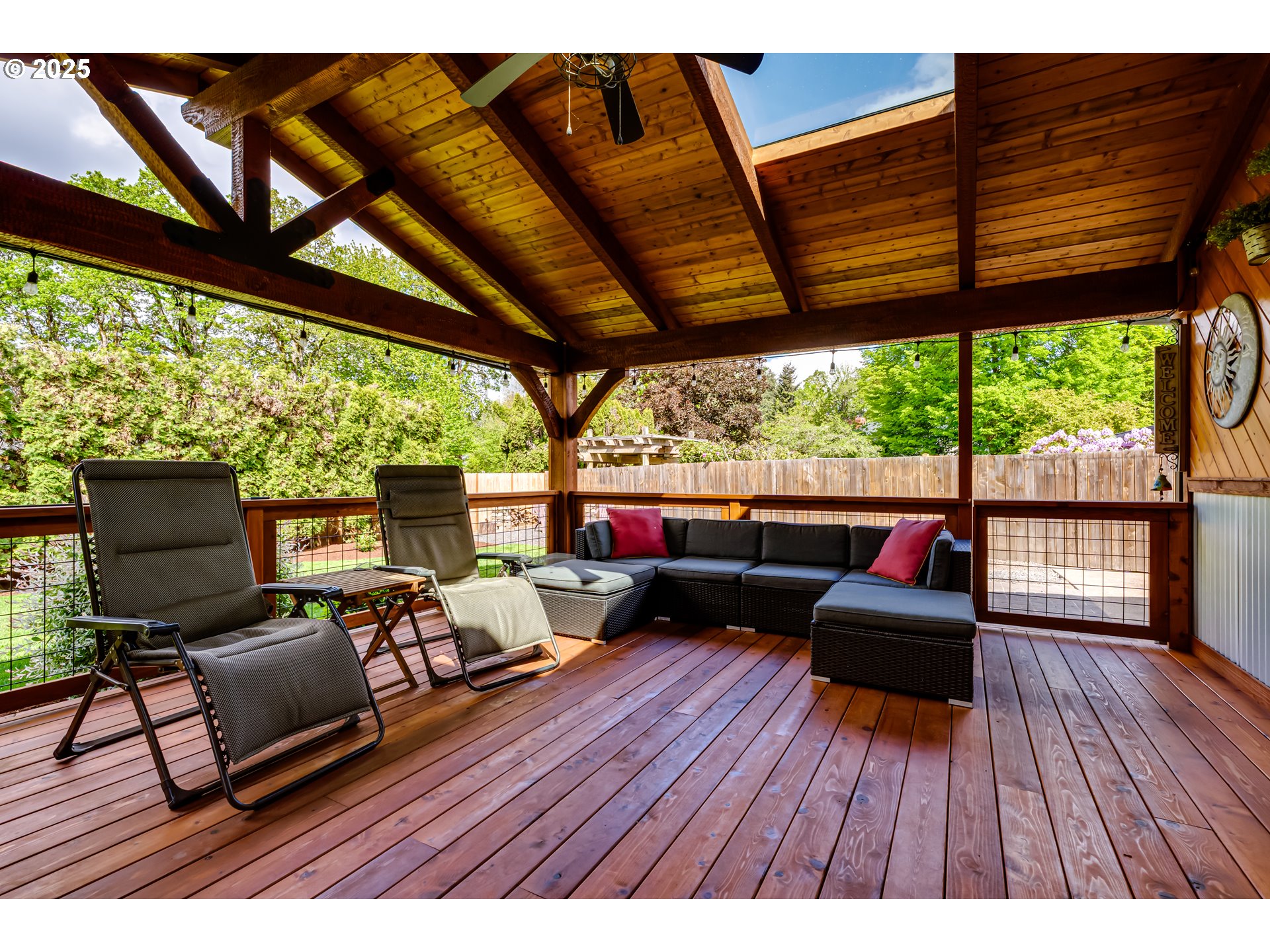 2852 Metolius Drive Eugene, OR 97408 - Photo 44 of 48 a living room with furniture tv and a large window