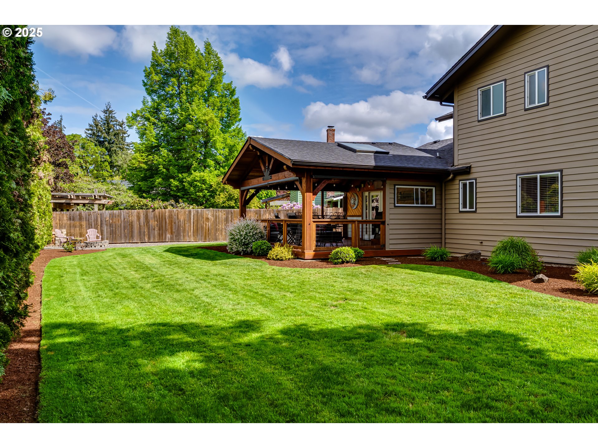 2852 Metolius Drive Eugene, OR 97408 - Photo 45 of 48 a view of a house with backyard and sitting area