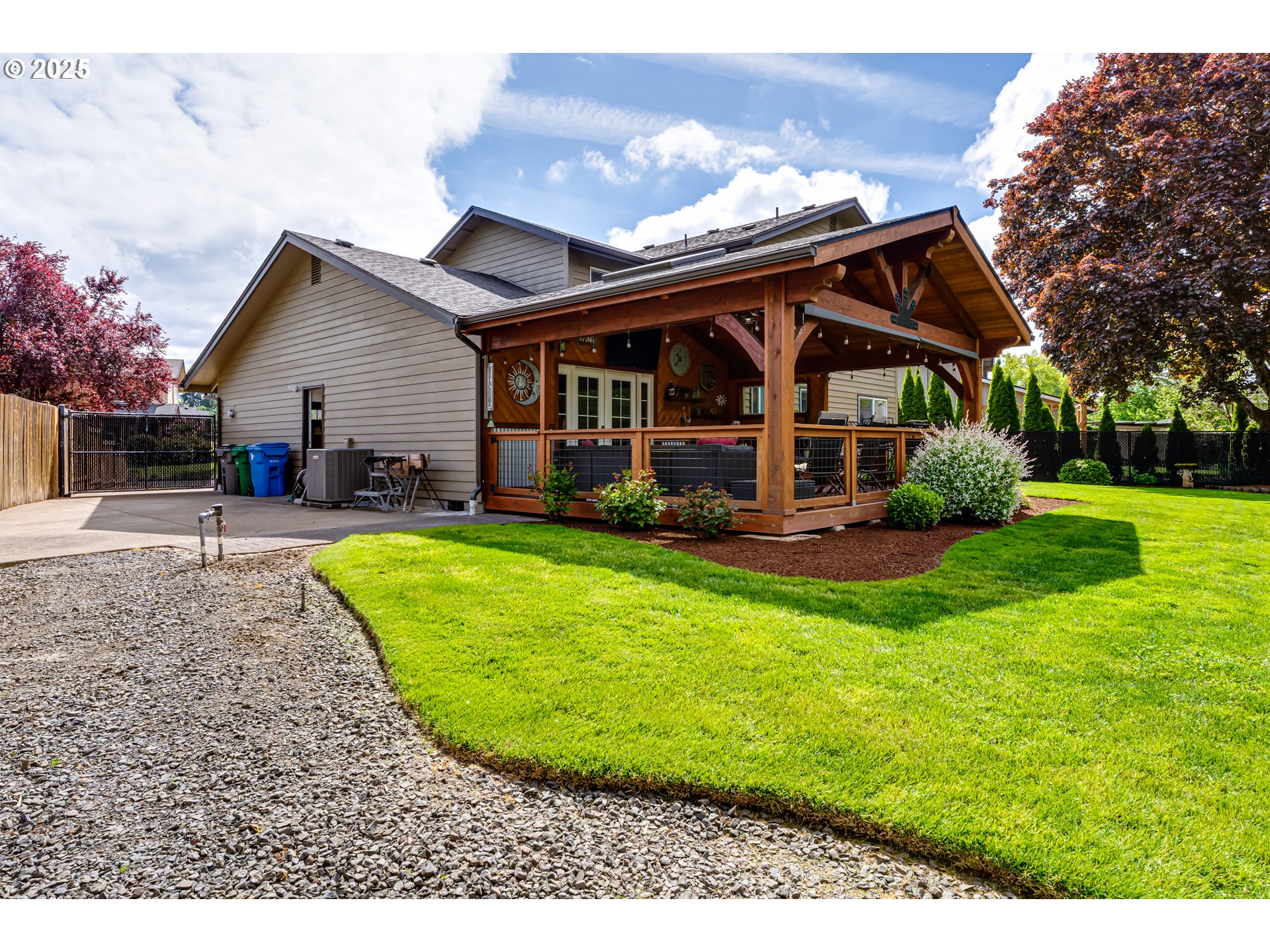 2852 Metolius Drive Eugene, OR 97408 - Photo 47 of 48 a view of a house with backyard and porch