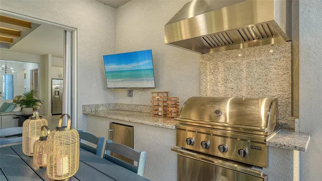 a living room with couches and pool view