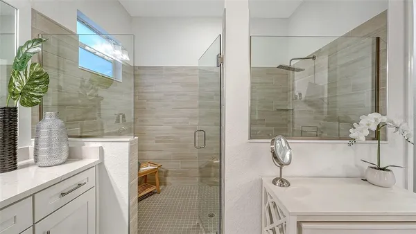 a en suite bathroom with a sink a toilet and shower