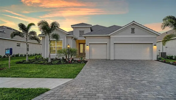 a front view of house with yard