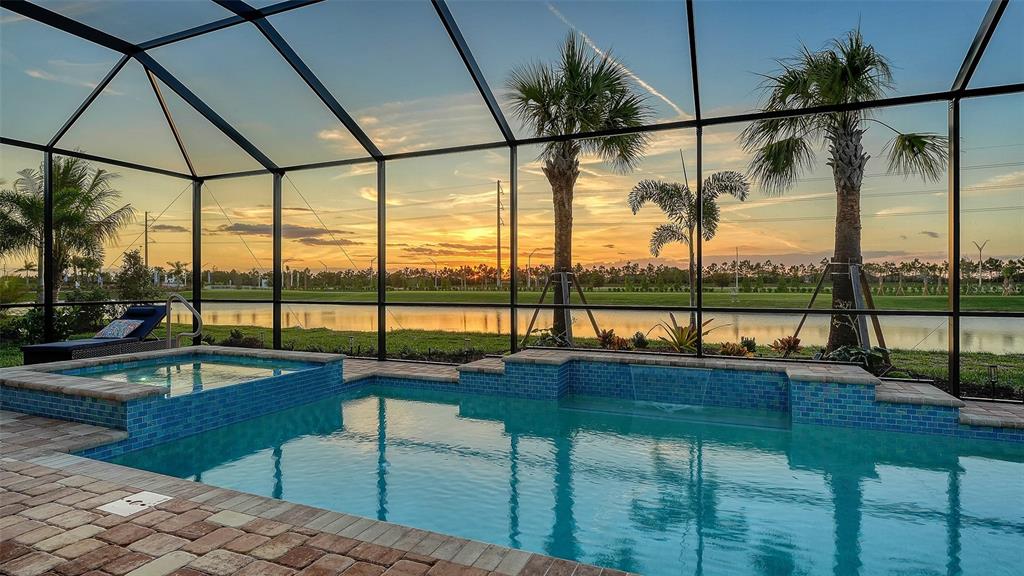 5612 Lightning Whelk Lane Lakewood Ranch, FL 34211 - Photo 39 of 44 a view of swimming pool from a balcony