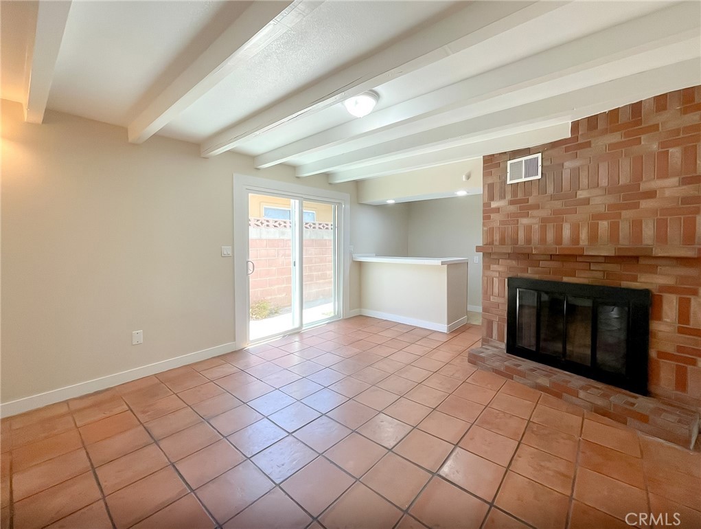 44739 3rd Street East Lancaster, CA 93535 - Photo 20 of 24 a view of an empty room with window and fire place