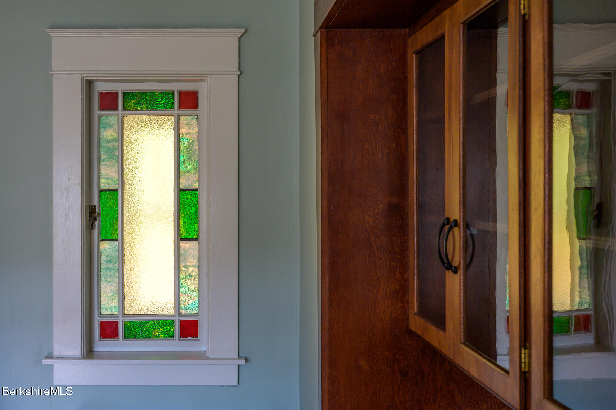 12 Riverfront Street Chester, MA 01011 - Photo 15 of 36 a bathroom with a window and a mirror