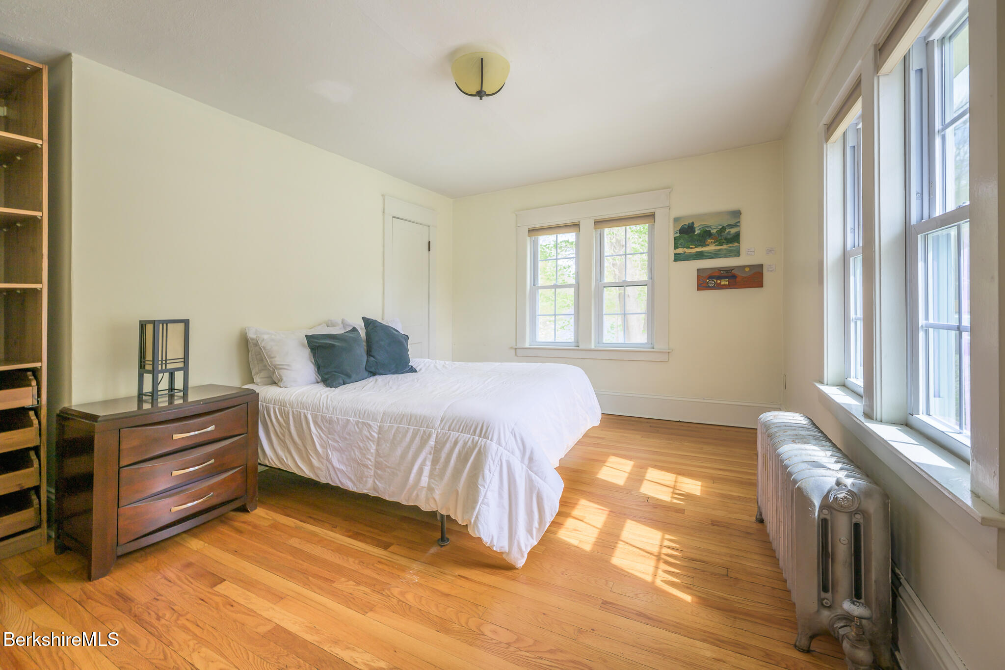 12 Riverfront Street Chester, MA 01011 - Photo 20 of 36 a bedroom with a bed and window