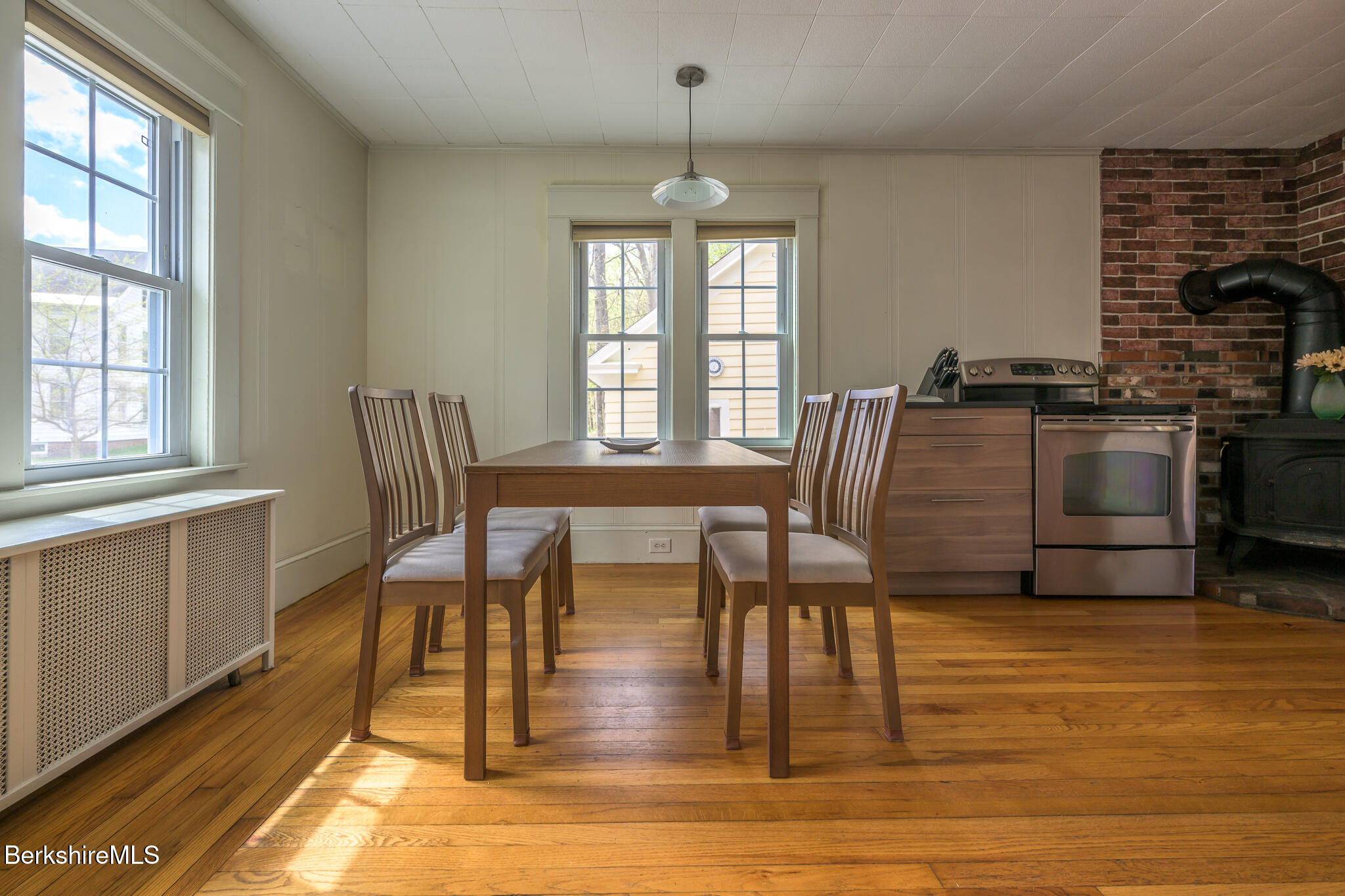 12 Riverfront Street Chester, MA 01011 - Photo 8 of 36 a view of a dining room with furniture window and wooden floor