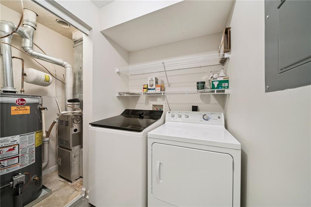 700 Hidden Ridge Court, Unit 302 South Park, PA 15129 - Photo 21 of 27 a utility room with dryer and washer