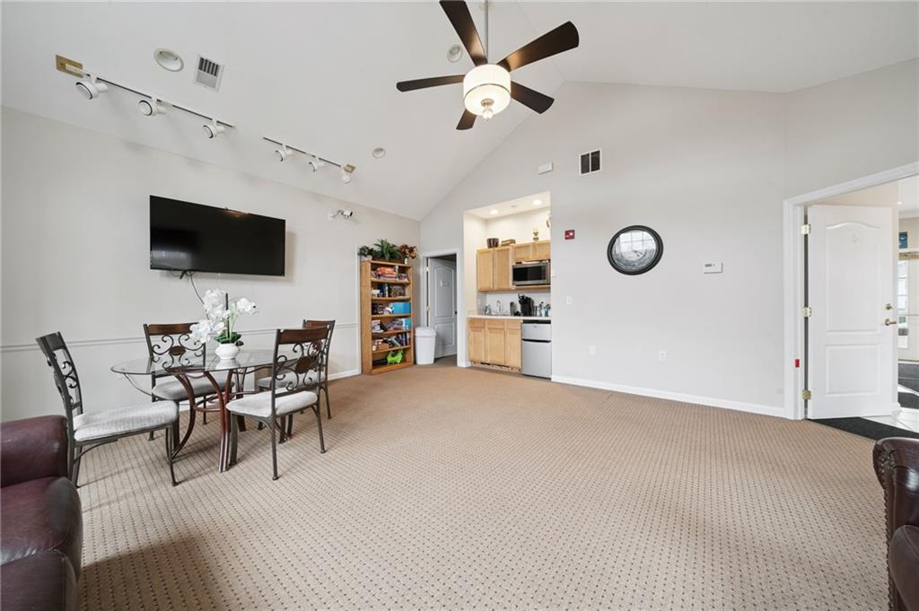 700 Hidden Ridge Court, Unit 302 South Park, PA 15129 - Photo 27 of 27 a living room with furniture and a flat screen tv