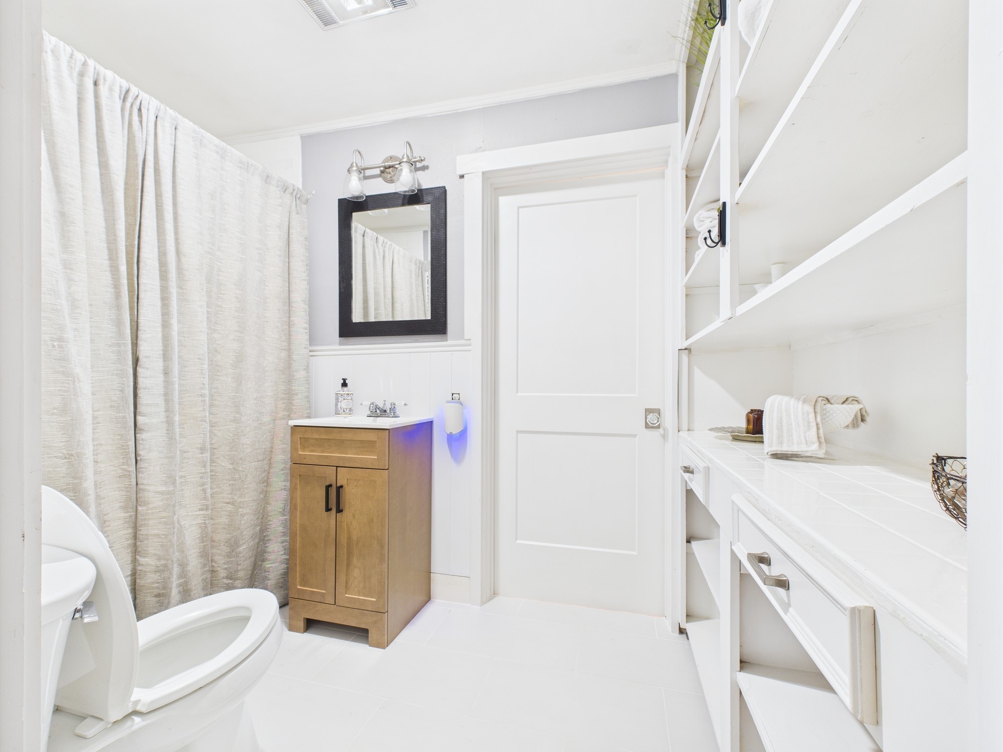 100 Hill Ranch Lane New Waverly, TX 77358 - Photo 12 of 23 a bathroom with a sink a toilet and shower