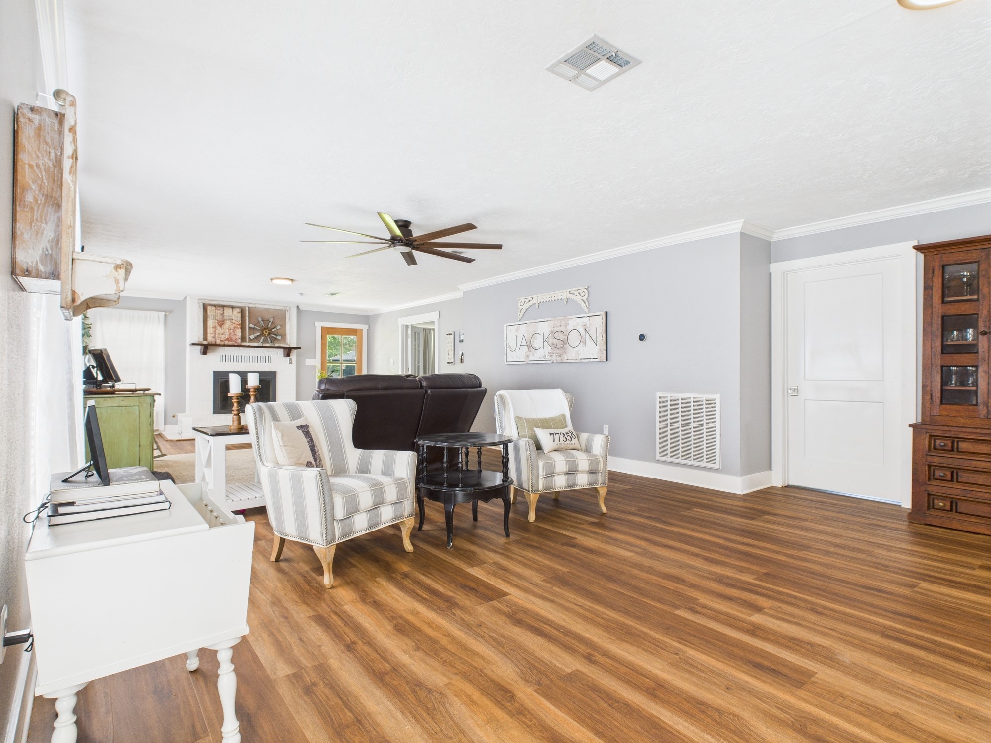 100 Hill Ranch Lane New Waverly, TX 77358 - Photo 21 of 23 a living room with furniture and a wooden floor