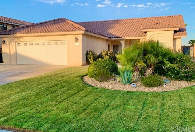 2304 South Desert Cassia Street Ridgecrest, CA 93555 - Photo 1 of 1 The front and backyard have been landscaped.