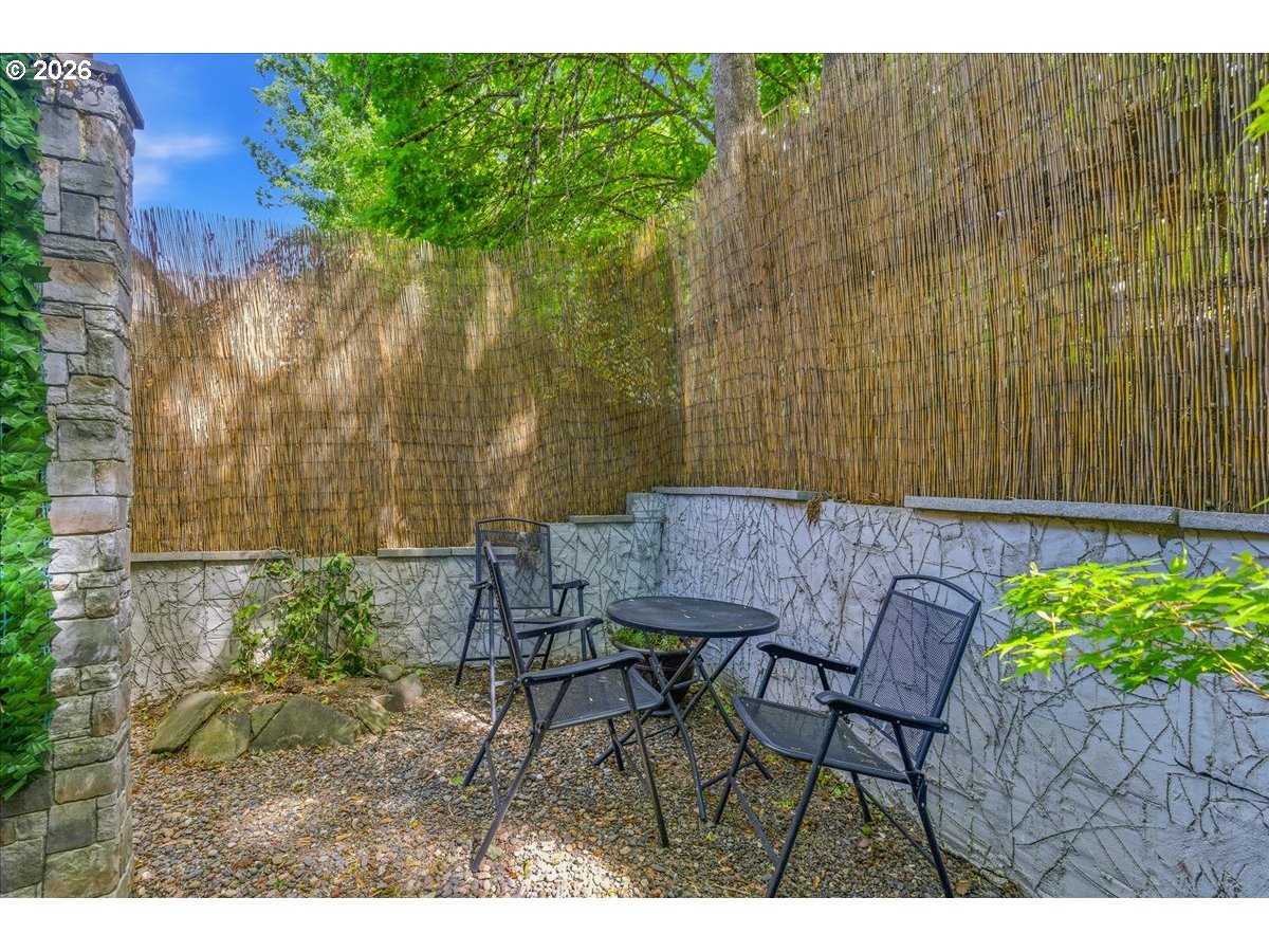 19240 Southwest Rosedale Court Beaverton, OR 97007 - Photo 30 of 38 a view of yard with table and chairs