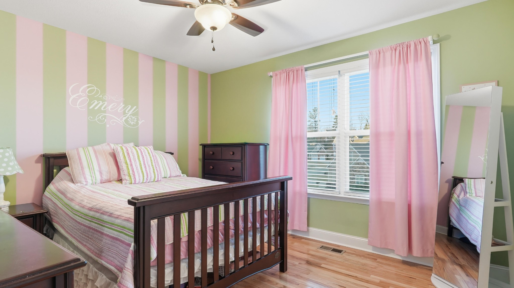 274 Live Oak Road Ringgold, GA 30736 - Photo 15 of 28 a bedroom with a bed and a chandelier