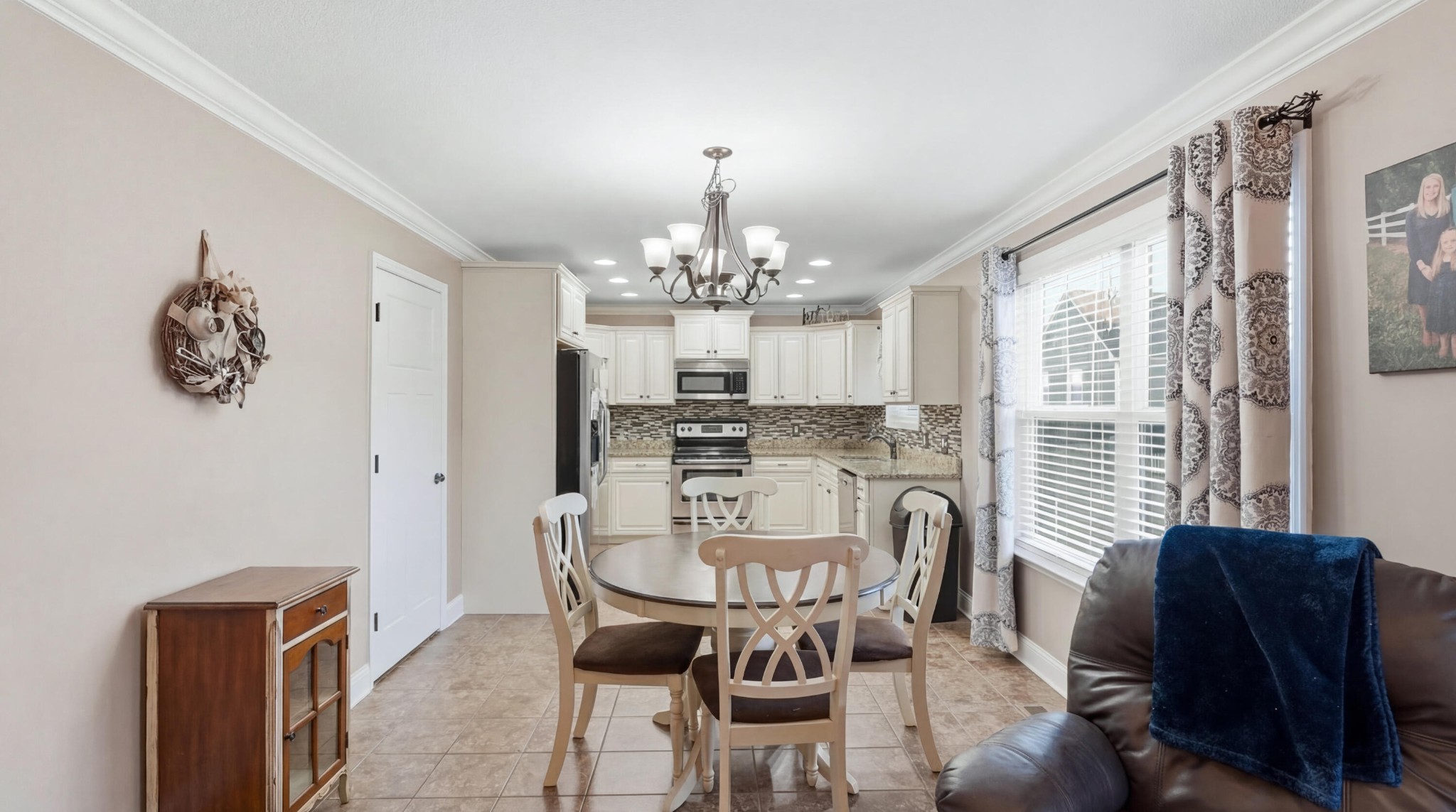 274 Live Oak Road Ringgold, GA 30736 - Photo 6 of 28 a view of a dining room with furniture and chandelier