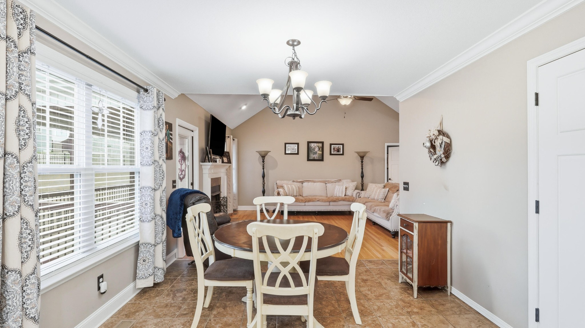 274 Live Oak Road Ringgold, GA 30736 - Photo 7 of 28 a view of a dining room with furniture window and wooden floor