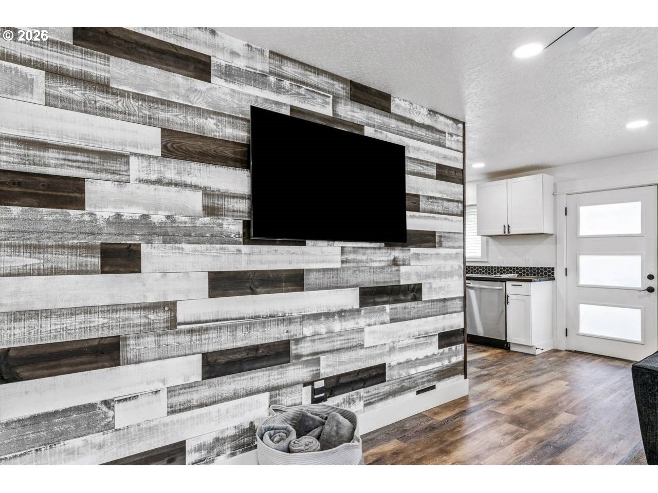 1184 2nd Street Florence, OR 97439 - Photo 19 of 44 a kitchen with stainless steel appliances kitchen island granite countertop a stove and a sink