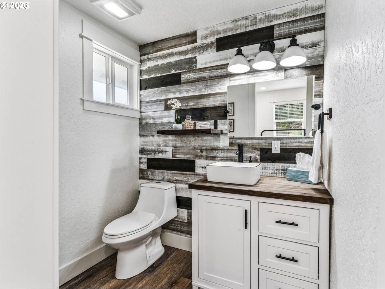 1184 2nd Street Florence, OR 97439 - Photo 26 of 44 a kitchen with a sink and a stove top oven