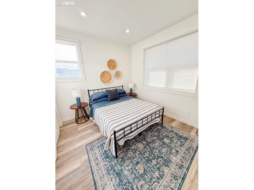 1184 2nd Street Florence, OR 97439 - Photo 40 of 44 a living room with a couch and a table